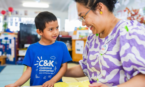 C&K teacher and child learning at kindy